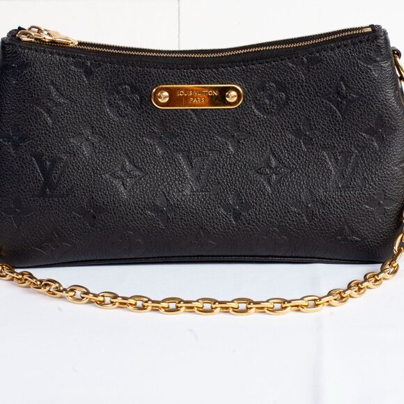 Authentic Louis Vuitton Black Monogram Empreinte Leather Liv Pochette - Picture 2 of 9